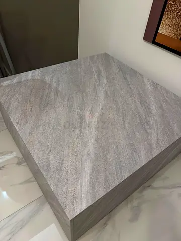 Solid grey bedside/nightstand with stone-look top (good condition)
