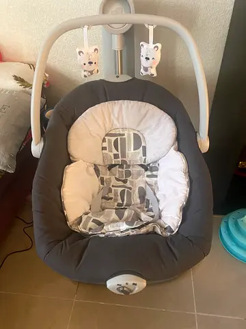 Baby electric rocker/swing seat with toys - good condition