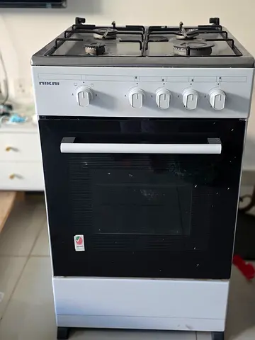 Used Nikai 4-Burner Gas Stove with Oven - White, Good Working Condition