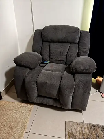 Comfortable single gray recliner armchair plus massager in very good condition.