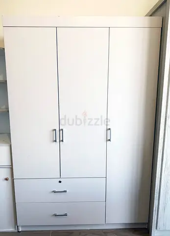 Wardrobe with side drawers