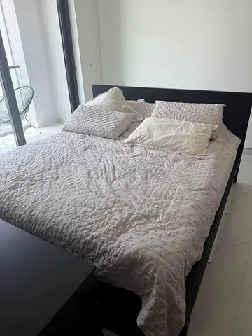 Dark wood king bed frame