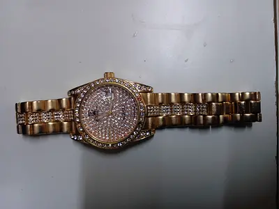 Gold-tone womens crystal pavé wristwatch, working condition
