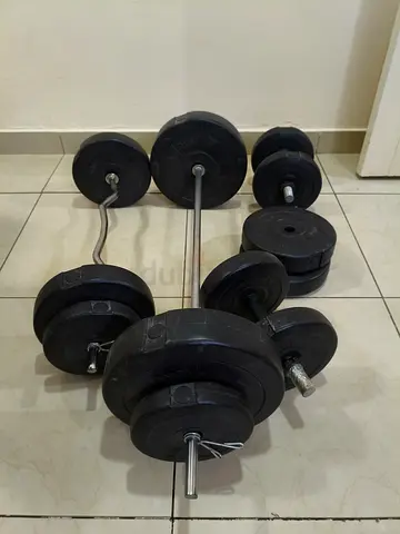 Set of adjustable Dumbbells with Barbell and Curl bar (DM Me For Good Price)