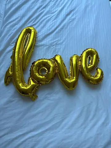 Gold foil balloon letter set spelling love - single decorative balloon