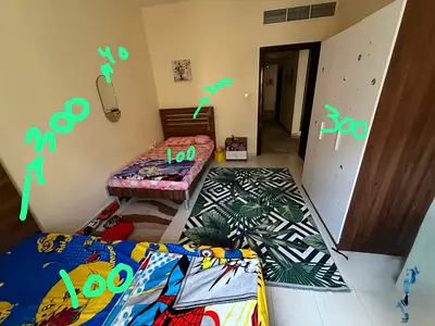 Two single beds with wardrobe and decorative rug - used, good condition