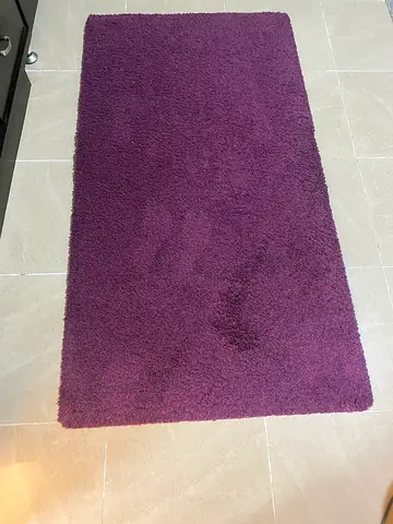Plum purple shaggy rug - medium size, good condition