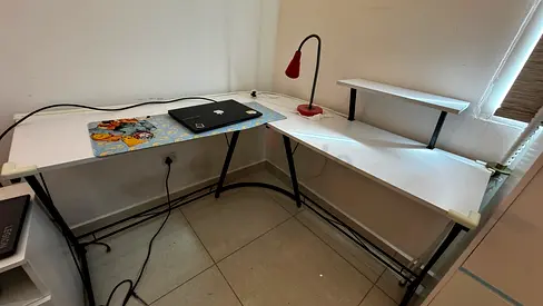 L-shaped white corner study desk with metal frame - good condition with free chair