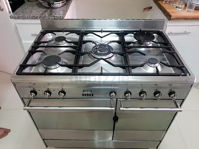 Smeg latest model stainless Steel  5 burner gass/electric dual oven freestanding stove 90x60