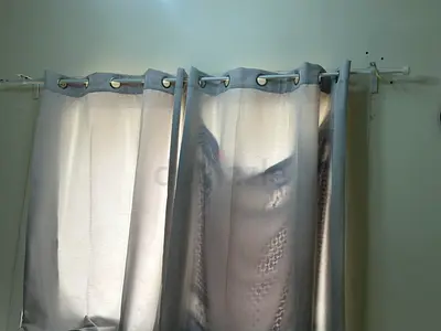 Light grey curtains (pair) — good condition