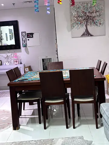 Solid wood 6-seater dining table with chairs - good condition