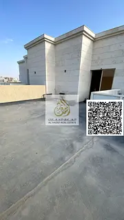Two bedrooms and a living room with a private roof terrace in Al Jurf 3; includes 2 bathrooms. This