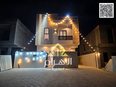 Villa for sale, including registration and ownership fees, near all services, close to Sheikh Mohammed Bin Zayed Road, on a main street, very prime lo