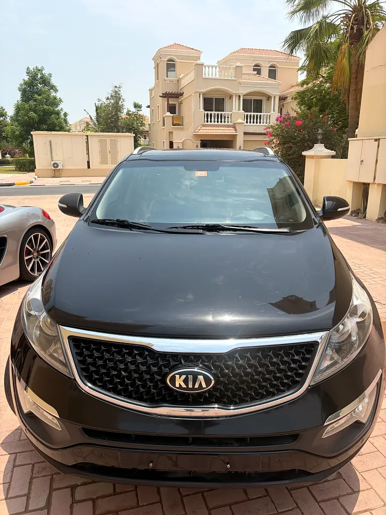 Kia Sportage 2015 — photo 1 of 13