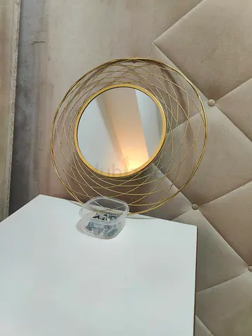 Round Decorative Gold Wall Mirror with Geometric Frame