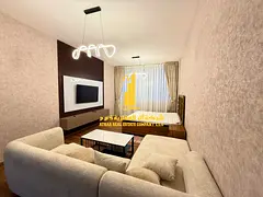 Furnished semi-detached kitchen studio with very high-end furniture for monthly rent in Ajman - Al R