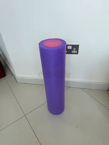 Purple foam roller for muscle release and stretching - excellent condition