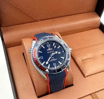 Omega Planet Ocean automatic mens watch with blue dial and fabric strap