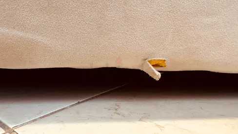Beige fabric sofa (single piece) — light wear on underside