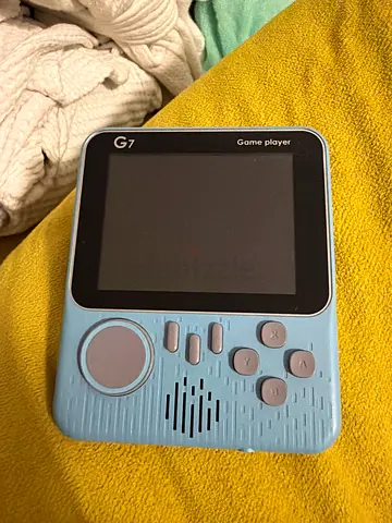 G7 Retro Handheld Game Player — Light Blue, 666 Games