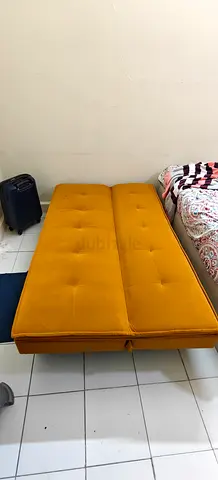 Mustard yellow foldable sofa bed (single/guest) in good condition