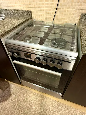 Stainless Steel 4-Burner Gas Cooker with Oven - Good Condition