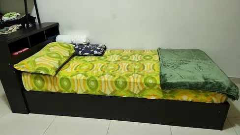 Single wooden bed with storage - black, good condition along with mattress