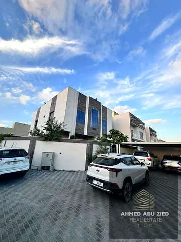 Fully Furnished 6BR Corner Villa with Gardens & Main Highway Access – Al Zahia