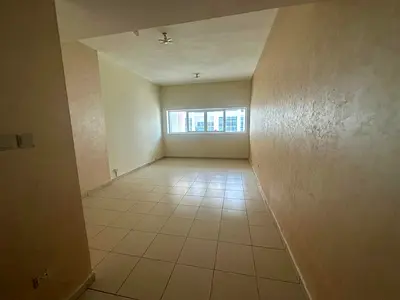 One bedroom and living room for annual rent in Ajman Towers One, excellent size at a special price