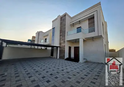 Two-story villa for rent in Ajman, Al Muwaihat 1 area. Excellent location. Consists of 5 master bedrooms, a majlis, a living room, a maid's room, and built-in wardrobes in the bedrooms. Large yard wit