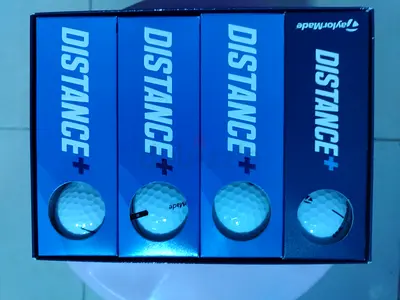 Set of 12 TaylorMade Distance+ Golf Balls - New in Box