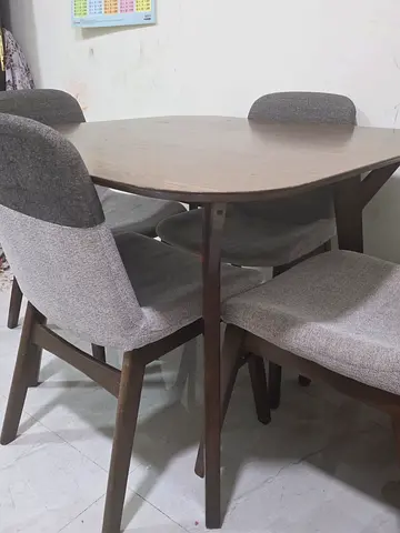 Solid Wood Dining Table with 4 Upholstered Chairs - Good Condition