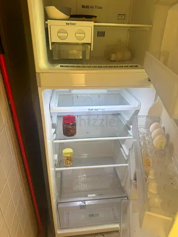 Compact top-freezer refrigerator in working condition