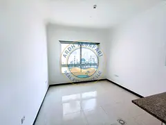 Lavish like a brand new studio close to road ,easy access to Dubai with central AC