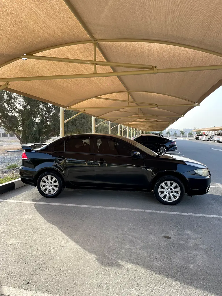 Mitsubishi Lancer Fortis 2014 — photo 1 of 6