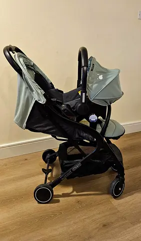 Light green compact travel stroller with infant car seat (good condition)