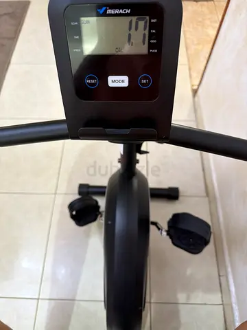 Used Merach Upright Exercise Bike with Display and Pedal Straps