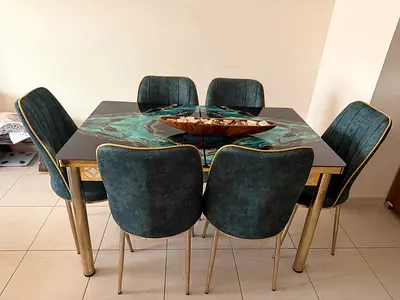 Marble-effect dining table with 6 teal velvet  chairs, good condition, ability to extend