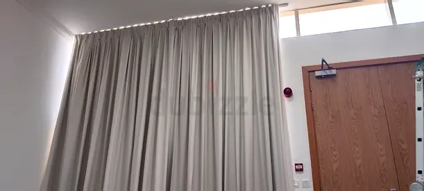 Full-length beige blackout curtains, ready to hang — good condition