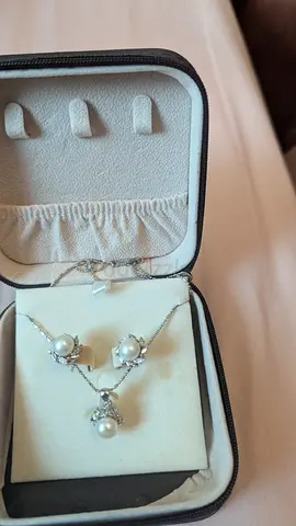 Pearl and cubic zirconia necklace with matching earrings set