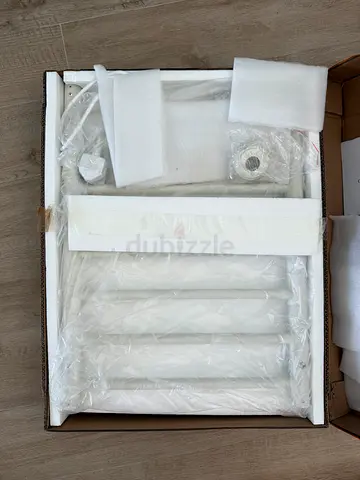 White heated towel rail / radiator - brand new, still in box