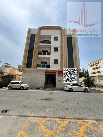 One-bedroom apartment with a living room and central air conditioning in Al Nuaimiya 2.