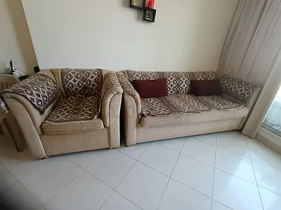 Sofa 5 seater in v good condition with covers