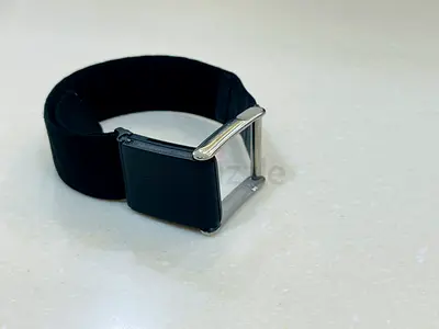 Used nee basic fitness tracker / wearable with fabric band (needs charging)