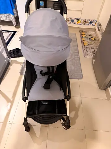 Lightweight grey compact baby stroller with sun canopy - good condition