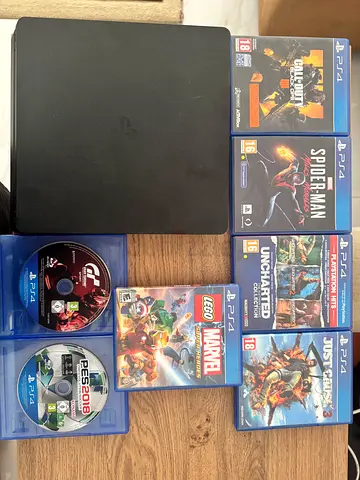 PS4 console with 8 games (Spider-Man miles morales, Uncharted, Call of Duty, more)