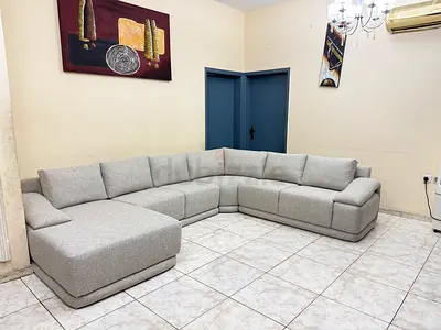 Light grey L-shaped sectional sofa - spacious modern fabric corner sofa