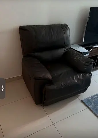 Dark brown leather recliner armchair - used