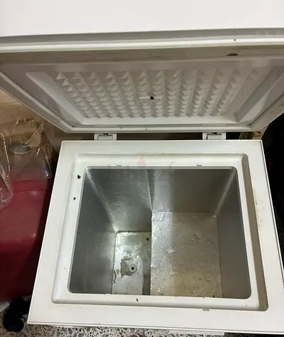 Used chest freezer - compact top-opening unit, needs cleaning 60 litre