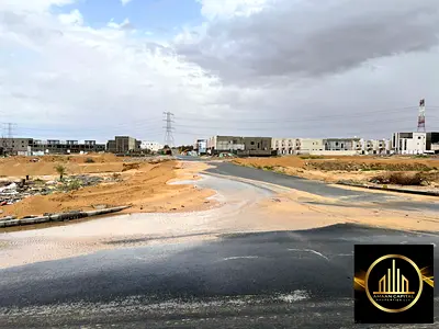 اراضي تاون هاوس للبيع جاهزة للانشاء شامل رسوم التسجيل بالقرب من طريق الامارات العابر
